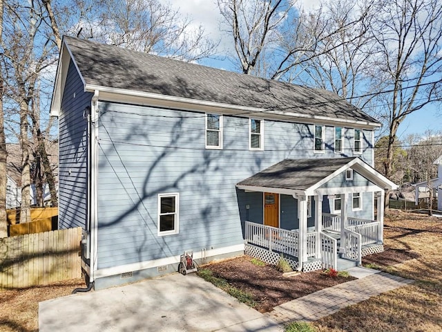 view of front of property with a patio and covered porch