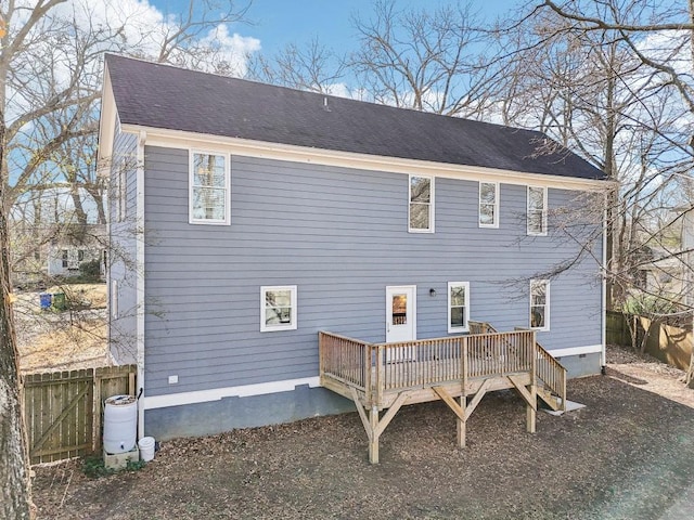 back of property featuring a deck