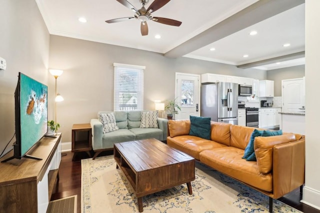 living room featuring ceiling fan, beam ceiling, and light hardwood / wood-style flooring