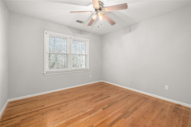 unfurnished room featuring ceiling fan and light hardwood / wood-style floors