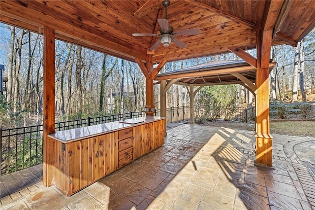 view of patio with ceiling fan