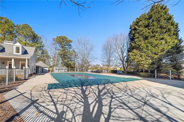 view of swimming pool with a patio