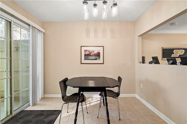 dining room featuring light tile patterned floors