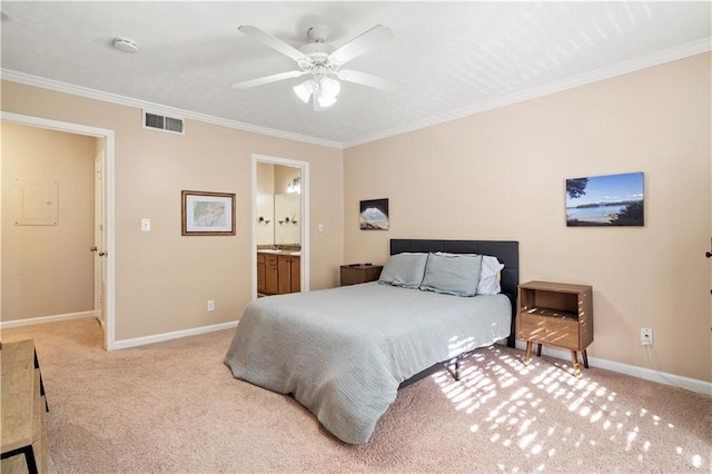 bedroom with light carpet, connected bathroom, ornamental molding, and ceiling fan