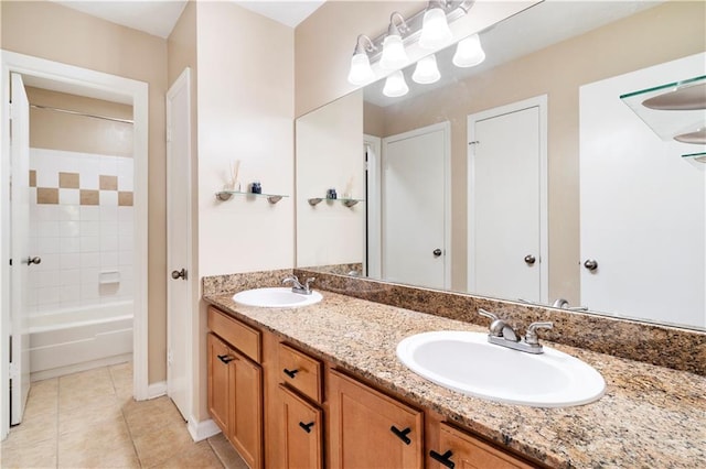 bathroom with vanity, shower / washtub combination, and tile patterned flooring