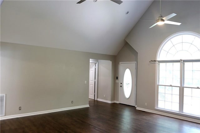 entrance foyer with high vaulted ceiling, ceiling fan, and dark wood-type flooring