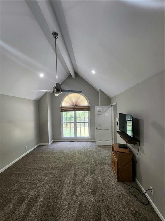 unfurnished living room featuring lofted ceiling with beams, ceiling fan, and carpet