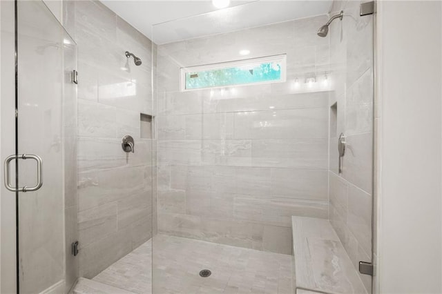 bathroom featuring a stall shower