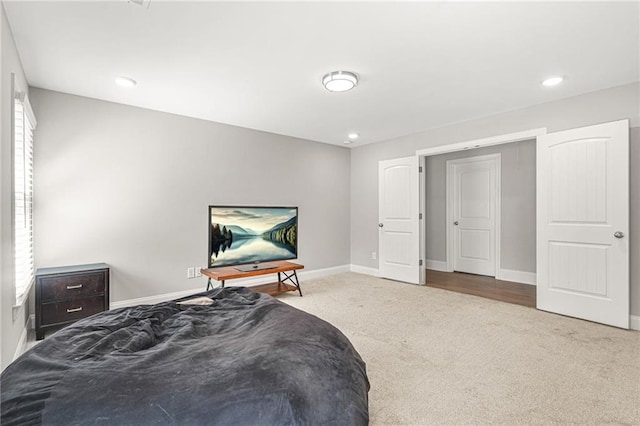 bedroom with carpet floors, baseboards, and recessed lighting