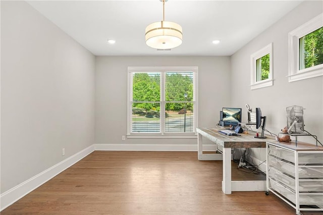 office space featuring wood finished floors, baseboards, and recessed lighting