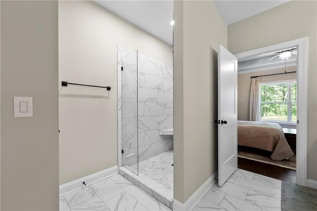 bathroom with ceiling fan and a tile shower