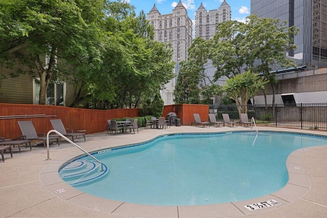 175 15th St NE Unit 410, Atlanta, GA 30309 - community pool with a patio and a city view