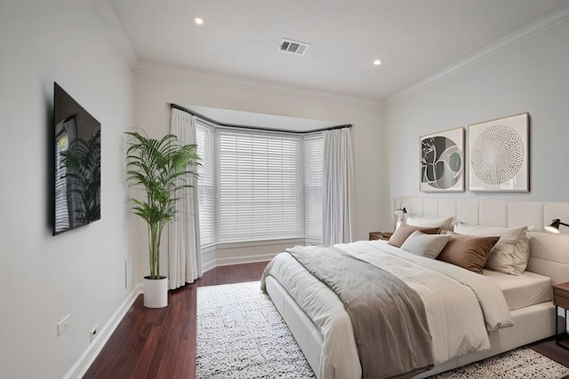 175 15th St NE Unit 410, Atlanta, GA 30309 - bedroom featuring ornamental molding, dark wood-style floors, baseboards, and recessed lighting