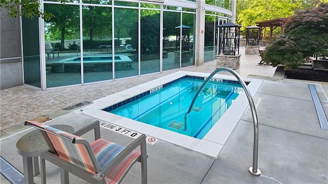 3300 Windy Ridge Parkway SE Unit 1121, Atlanta, GA 30339 - view of pool with a community hot tub, a patio area, and a swimming pool