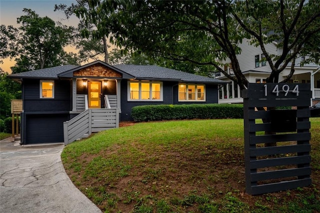 1494 May Ave SE, Atlanta, GA 30316 - view of front of house with driveway, a lawn, stairway, and a garage
