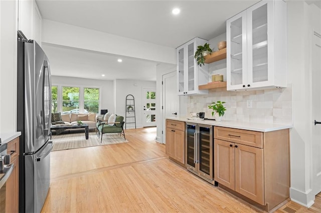 1494 May Ave SE, Atlanta, GA 30316 - bar with wine cooler, freestanding refrigerator, light wood-style flooring, decorative backsplash, and recessed lighting