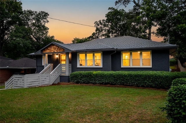 1494 May Ave SE, Atlanta, GA 30316 - view of front of home with a front lawn, brick siding, and a shingled roof