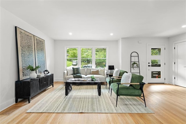 1494 May Ave SE, Atlanta, GA 30316 - living room with healthy amount of natural light, light wood finished floors, recessed lighting, and baseboards