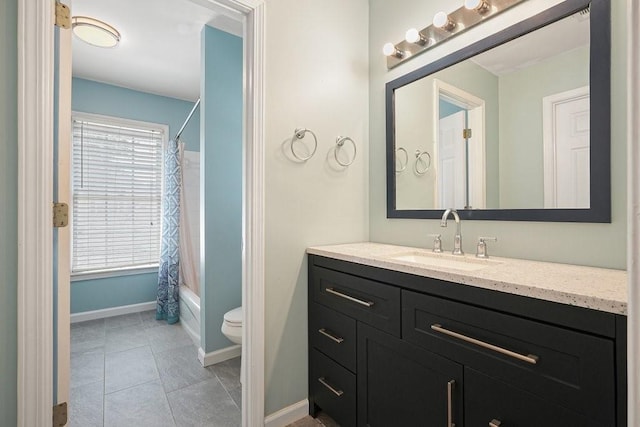 full bathroom with tile patterned flooring, toilet, vanity, baseboards, and shower / tub combo with curtain