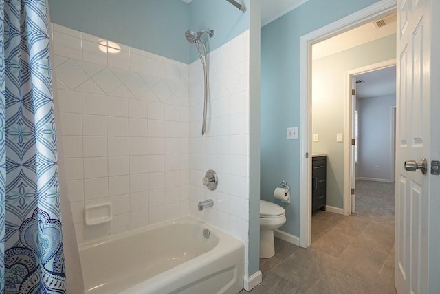 full bath with toilet, shower / tub combo, vanity, tile patterned flooring, and baseboards