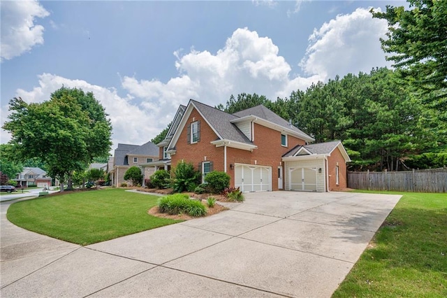 5635 Upper Creek Ct, Suwanee, GA 30024 - view of front of house featuring brick siding, concrete driveway, and an attached garage