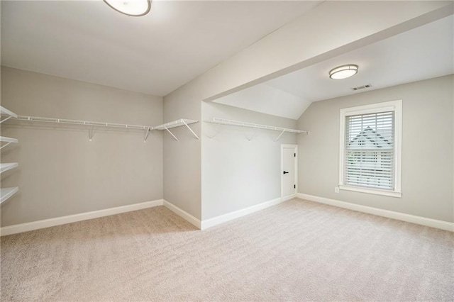 5635 Upper Creek Ct, Suwanee, GA 30024 - spacious closet with carpet flooring and lofted ceiling