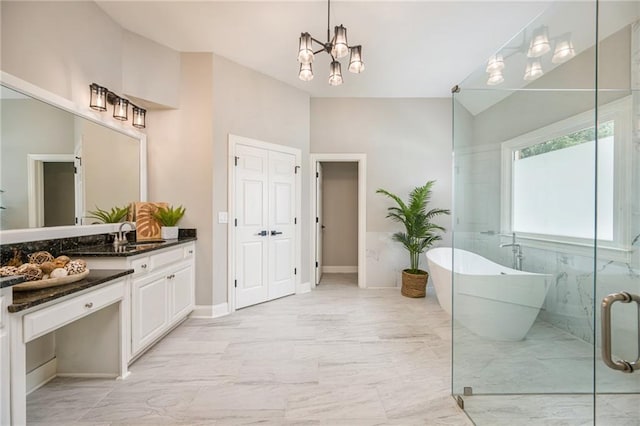 5635 Upper Creek Ct, Suwanee, GA 30024 - full bathroom featuring a freestanding tub, vanity, marble look tile flooring, a chandelier, and a shower with door