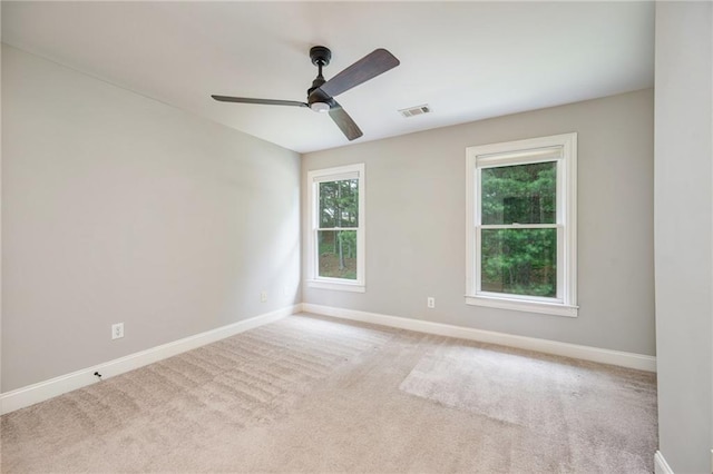 5635 Upper Creek Ct, Suwanee, GA 30024 - empty room with plenty of natural light, baseboards, and carpet flooring