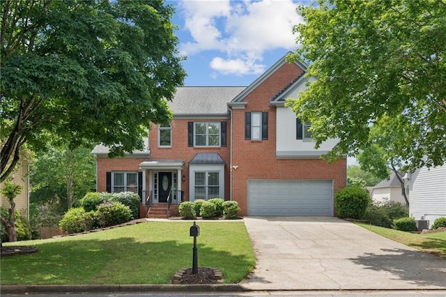 view of front of property with concrete driveway, brick siding, a front yard, and a garage