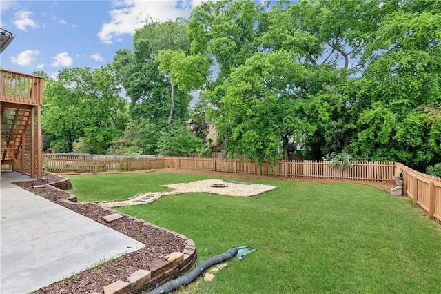 view of yard featuring a fenced backyard and a patio