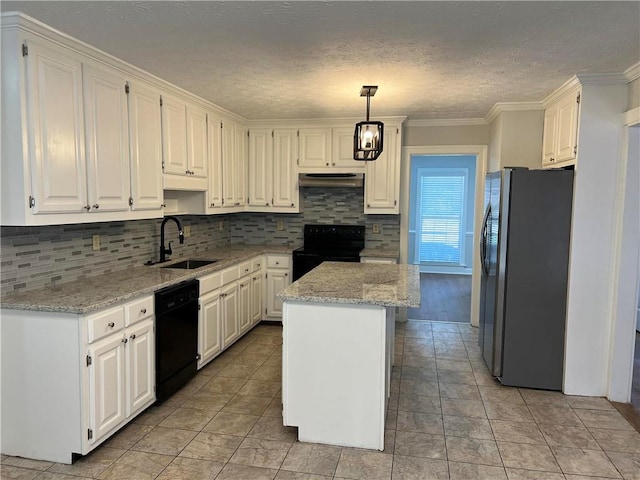 kitchen with a kitchen island, sink, black appliances, pendant lighting, and white cabinetry