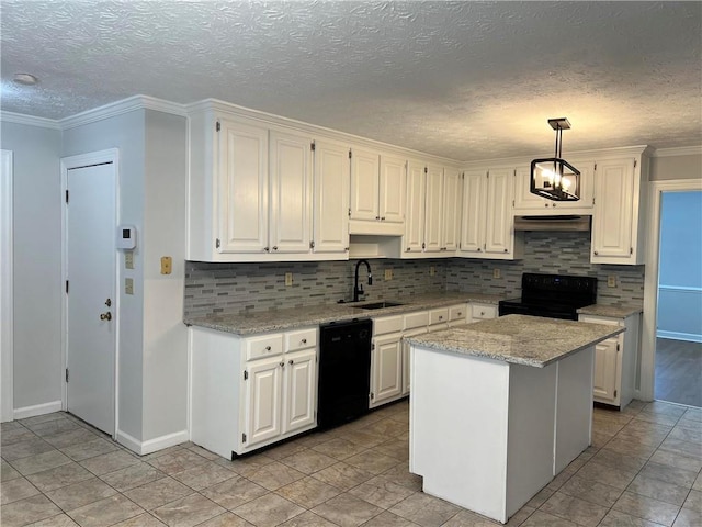 kitchen featuring black appliances, sink, a kitchen island, white cabinetry, and pendant lighting