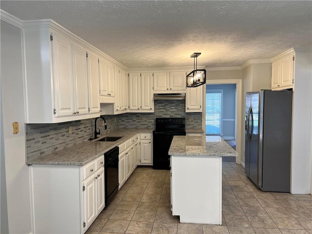 kitchen with white cabinetry, black appliances, sink, and decorative light fixtures