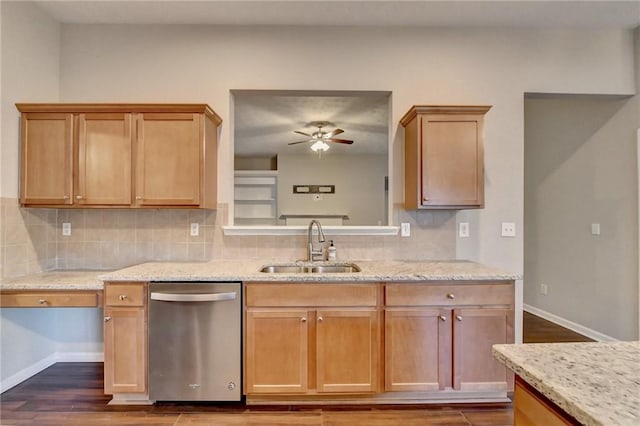 kitchen featuring tasteful backsplash, a sink, ceiling fan, light stone countertops, and dishwasher