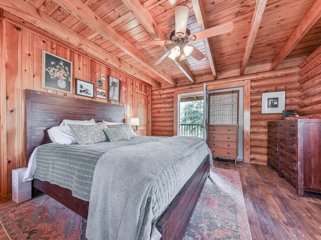 bedroom with access to exterior, beamed ceiling, log walls, wood ceiling, and hardwood / wood-style floors