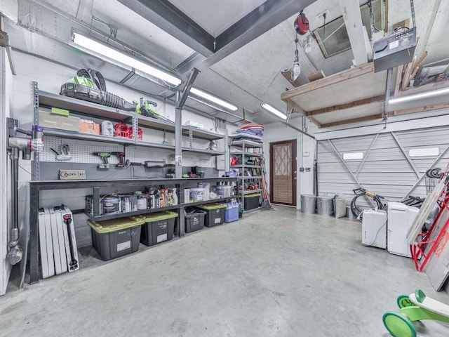 garage featuring a garage door opener