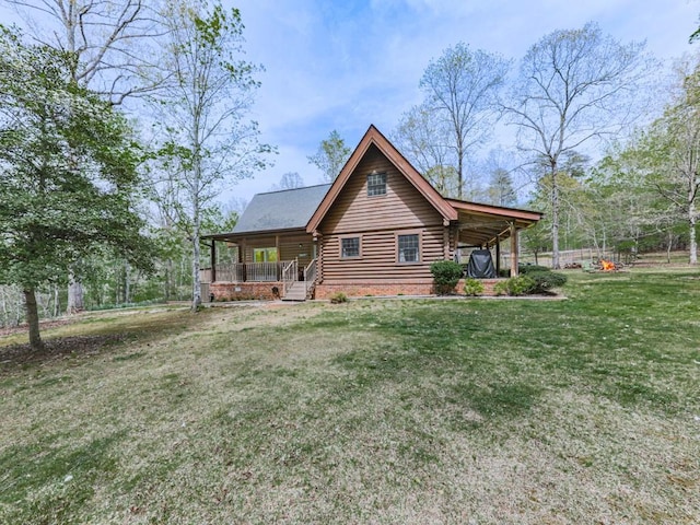 exterior space featuring log exterior, a lawn, and covered porch
