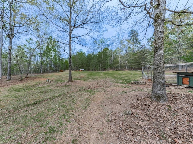 view of yard featuring a view of trees