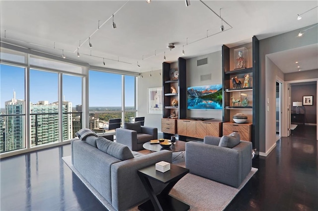 living room featuring plenty of natural light and expansive windows