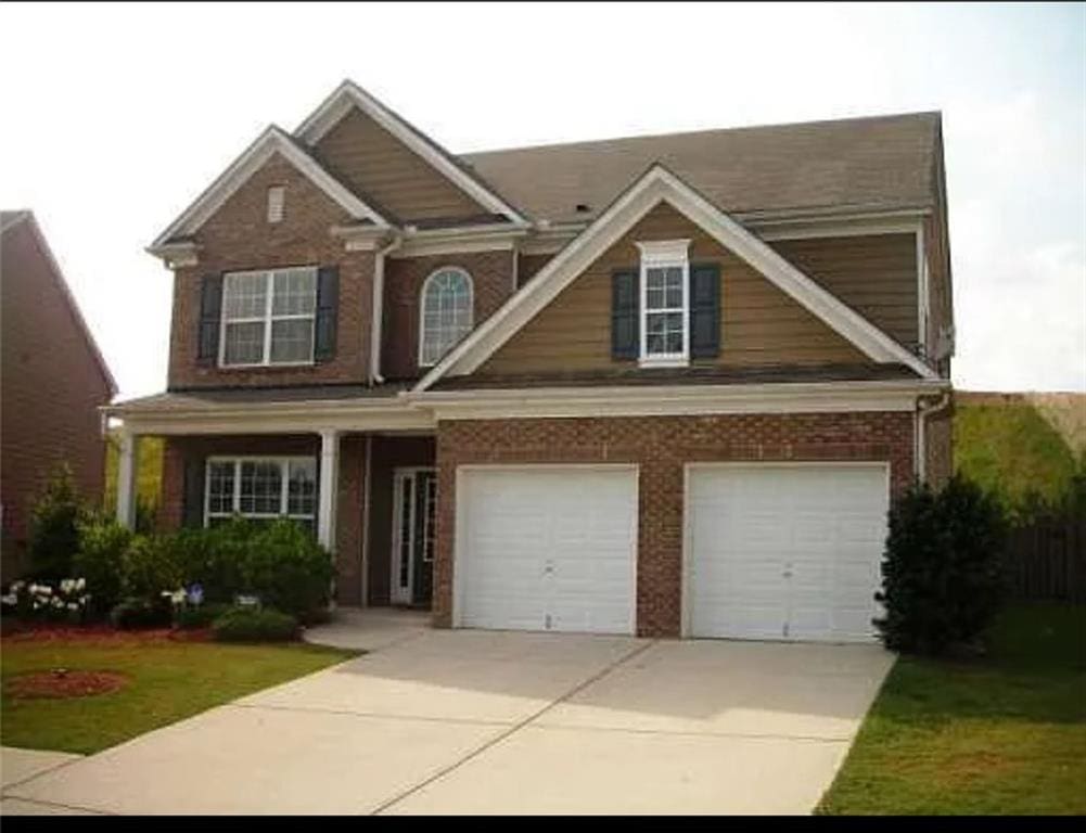 craftsman house with a garage