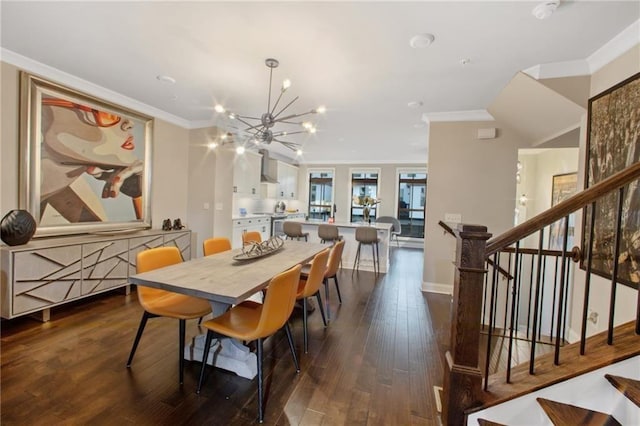 dining room featuring an inviting chandelier, dark hardwood / wood-style flooring, and crown molding