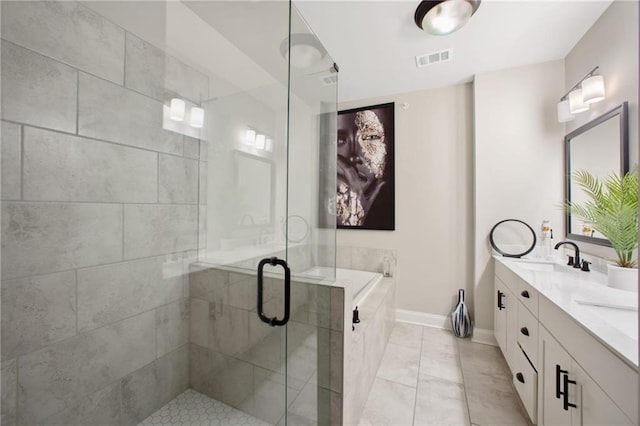 bathroom featuring separate shower and tub and vanity