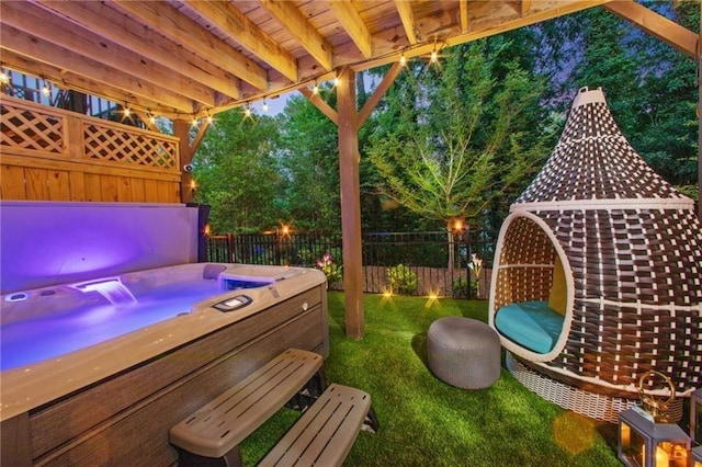 view of patio / terrace with a hot tub