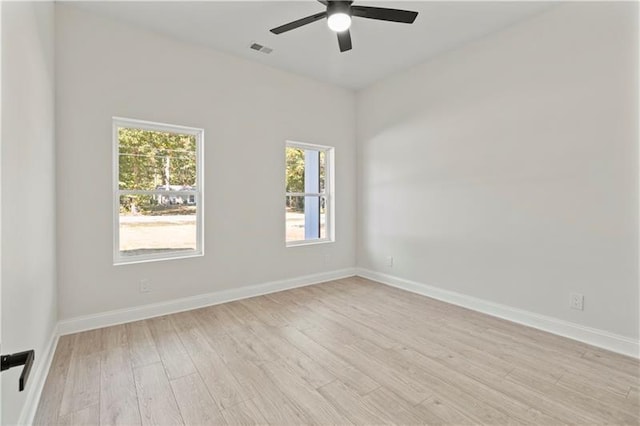 unfurnished room with ceiling fan and light hardwood / wood-style flooring