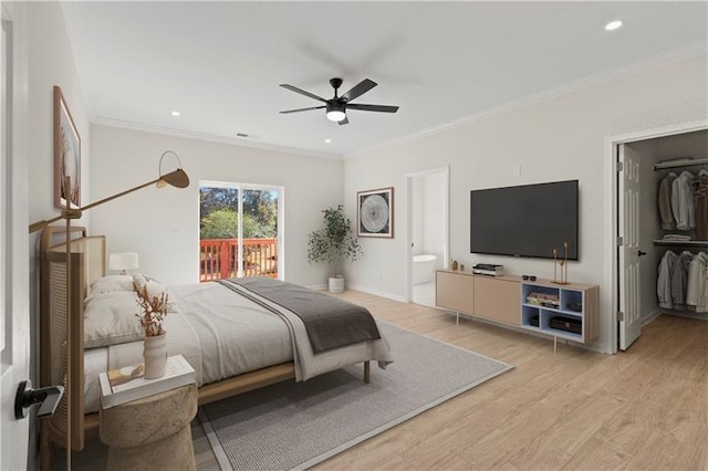 bedroom featuring crown molding, ceiling fan, light hardwood / wood-style flooring, and connected bathroom