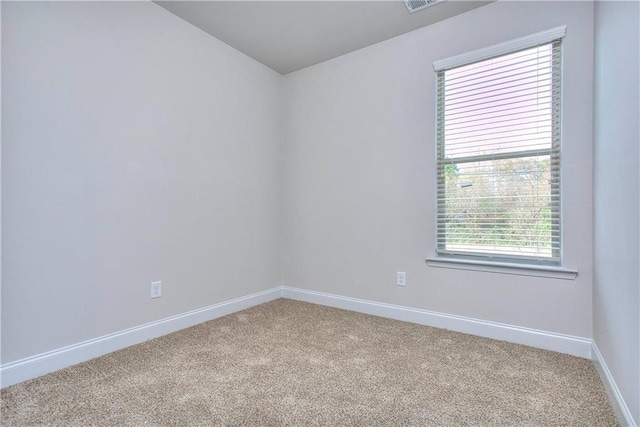 spare room with carpet flooring