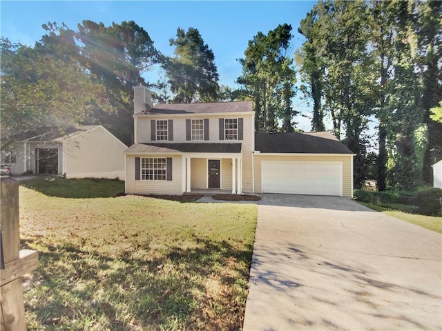 colonial-style house featuring a front yard