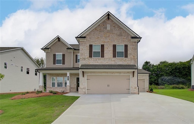 craftsman-style house with a garage and a front yard