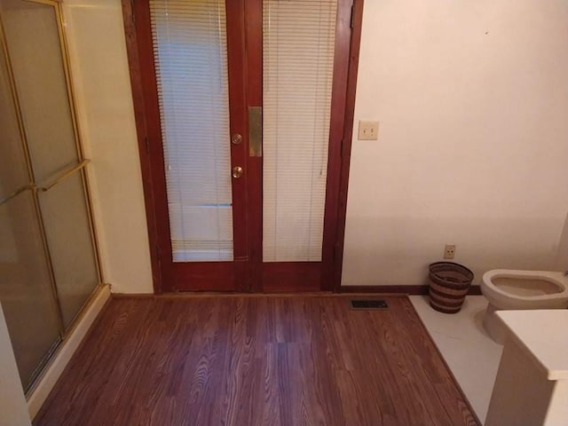 hallway featuring dark hardwood / wood-style floors