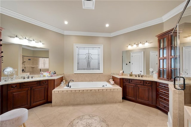 bathroom featuring crown molding, a stall shower, a sink, a bath, and tile patterned floors